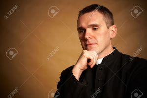 8887398-Thinking-priest-with-hand-under-chin-Stock-Photo-priest-pastor-catholic